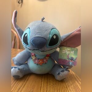 stitch plush - disney - see photos (pink marks on ear and foot)